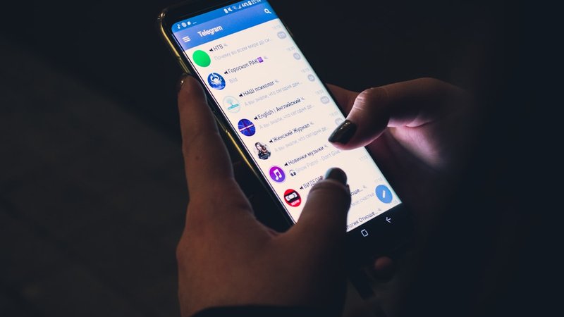 A legitimate crypto Telegram channel publishes entries, stops, and post-trade reviews